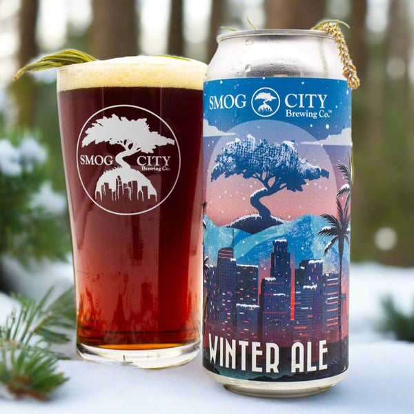 can and glass of winter ale in the snow