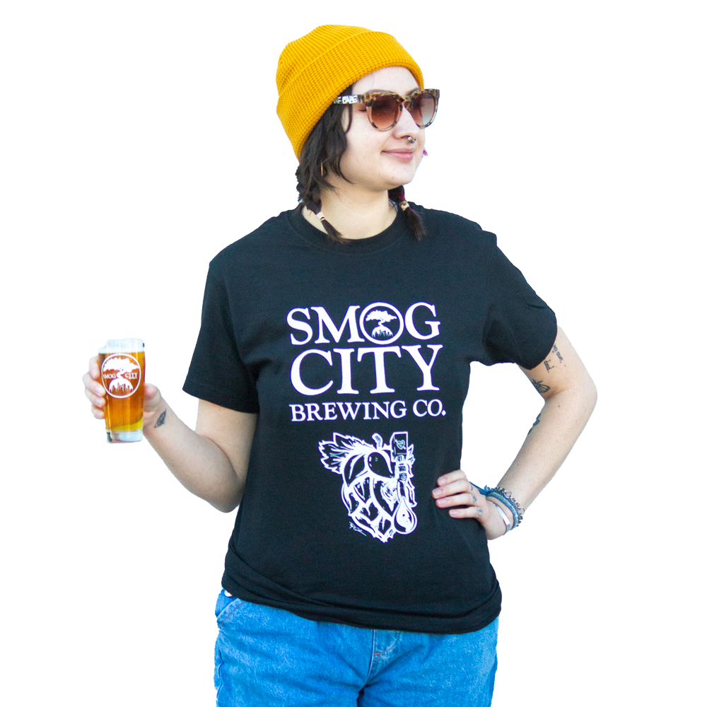 Woman in yellow beanie wearing black Smog City IPA Hop T Shirt