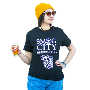 Woman in yellow beanie wearing black Smog City IPA Hop T Shirt